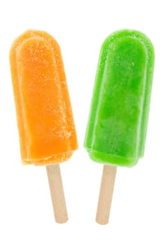 orange and kiwi popsicles isolated on white background.
