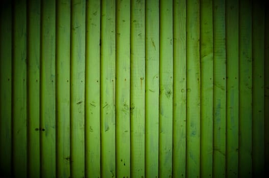 Green wood wall background with vignette