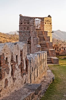 Kumblegarth Fort, Kumbhalgarth, Rajasthan, India, Landscape of one of the dilapidated towers of the 15th century built fort showing part of the wall that stretches 34kms and the only other man made structure aprt from wall of China that is visible from sp