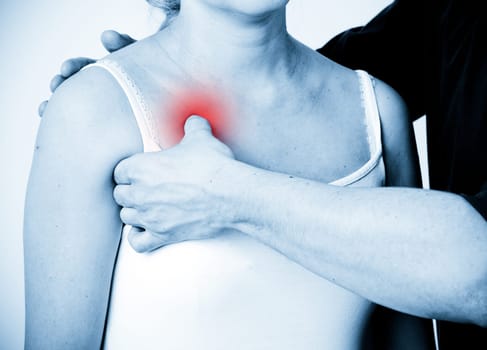 Massage therapist giving a massage. female receiving professional massage. pain concept.