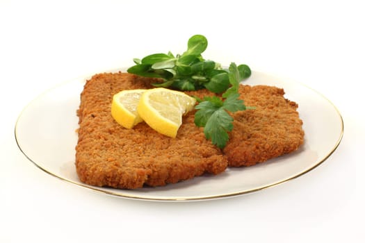 Viennese style schnitzel with lemon and parsley