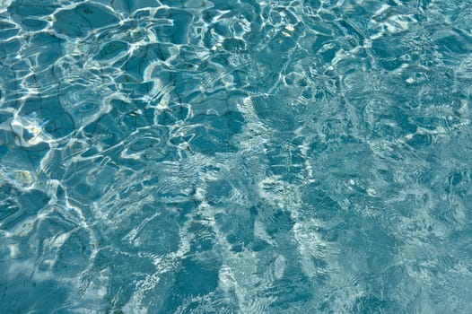 Most beautiful clear pool water reflecting in the sun