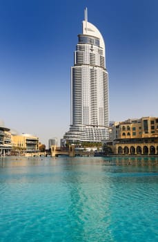 DUBAI, UAE - FEB 22: The Address Hotel in the downtown Dubai area overlooks the famous dancing fountains, taken on 22 February 2012 in Dubai. The hotel is surrounded by a mall, hotels and Burj Khalifa