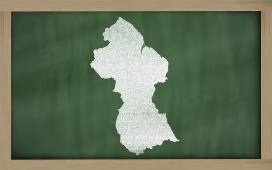 drawing of guyana on blackboard, drawn by chalk