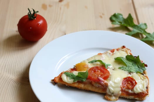 Pizza with cheese and rocket