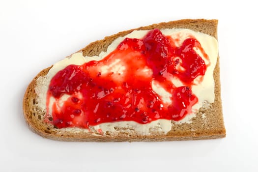 A smeared bread with jam and butter on a white background