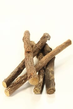 some pieces of liquorice against a white background