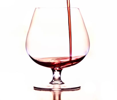 Detail of the wine glass - pouring wine
