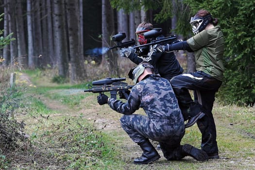 Paintballers in action