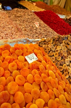 Piles of dried apricots at a street vendor at Morroco