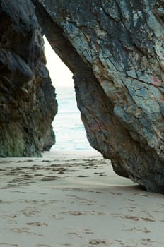 Passage between two rocks at Portuguese beach