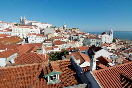 View of Lisbon wth church and river on the background