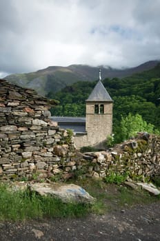 Old medieval church and stone wall at Northern Spain