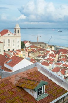 View of Lisbon wth church and river on the background