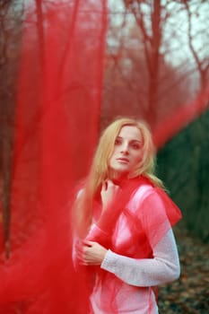 A beautiful young woman with a red shawl