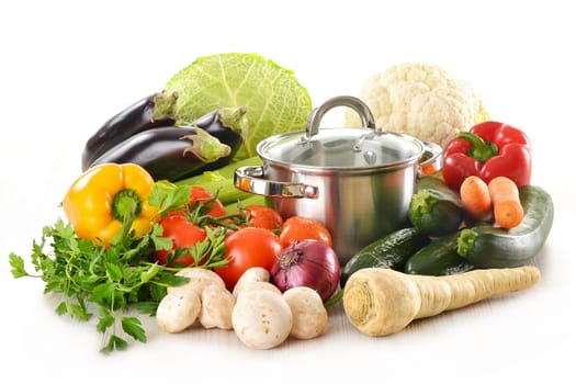 Composition with pot and fresh vegetables isolated on white
