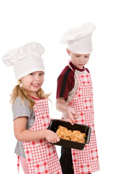 two children in the chef&#039 s hat isolated on white background