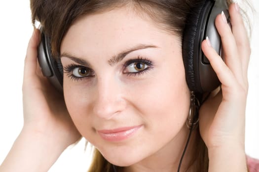 An image of face of woman in headphone