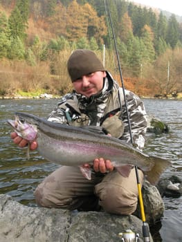 Fisherman catched big trout