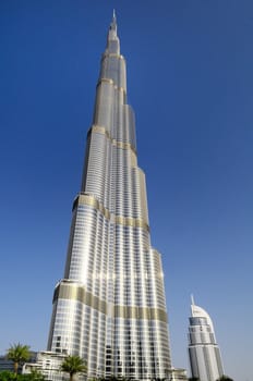 DUBAI, UAE - FEBRUARY 22: DUBAI, UAE - FEB 22: The Address Hotel in the downtown Dubai area overlooks the dancing fountains, and Burj Khalifa facade on February 22, 2012 in Dubai, UAE. Burj Khalifa is a tallest building in the world, at 828m. Located on D