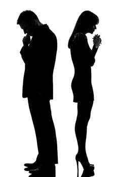 one caucasian sad couple back to back man thinking and woman crying standing back to back man and woman in studio silhouette isolated on white background