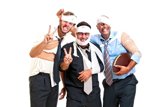 Group of injured businessmen after a rugby game