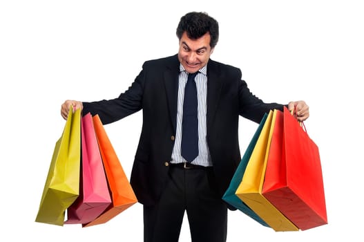 Man posing with shopping bags
