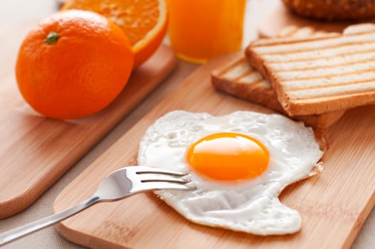 Fried egg for breakfast close up shoot