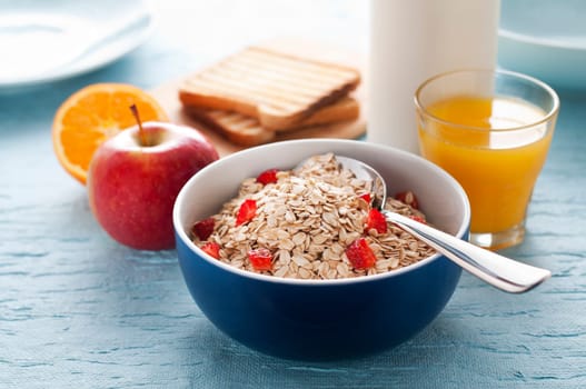 Muesli with fruit for breakfast close up shoot