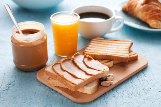 Peanut butter and toast for breakfast close up