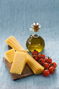 Cooking ingredients on blue background close up