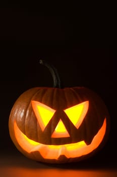 Halloween pumpkin on dark background close up shoot