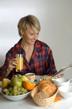 young woman at the table for breakfast