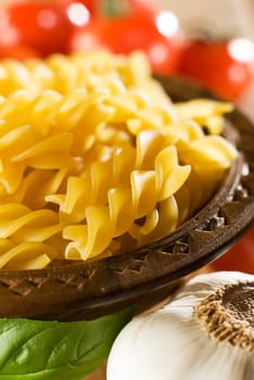 raw pasta in a bowl close up shoot