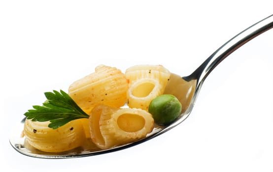 fresh pasta on a spoon isolated on white