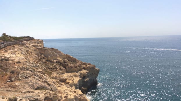 Summer Atlantic ocean rocky coastline near Carvoeiro town, Lagoa, Algarve - Portugal.