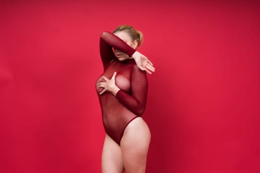 Fashion portrait of young beautiful woman with big breasts. Carefree model in lingerie.