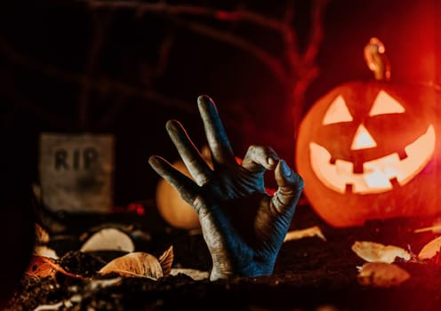 Terrible zombie hand with okay sign from grave. Halloween, Ok, positive concept. Creepy moment from undead life. Living nightmare comes to life. High quality