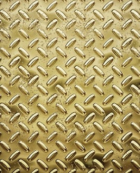 a very large sheet of roughened gold tread or diamond plate