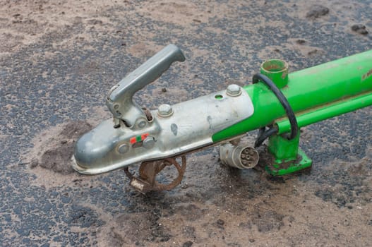 closeup of a green trailer hitch