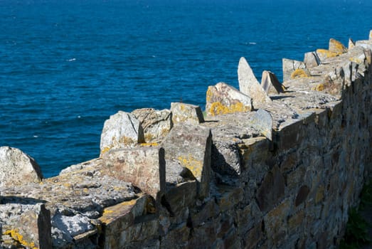 Stone wall with sea background in Port Isaac Cornwall
