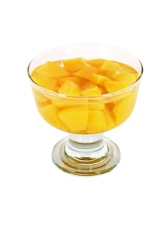 Orange peach compote in glass isolated on white