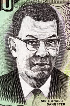 Donald Sangster (1911-1967) on 100 Dollars 2007 Banknote from Jamaica. Jamaican politician and the second Prime Minister of Jamaica.