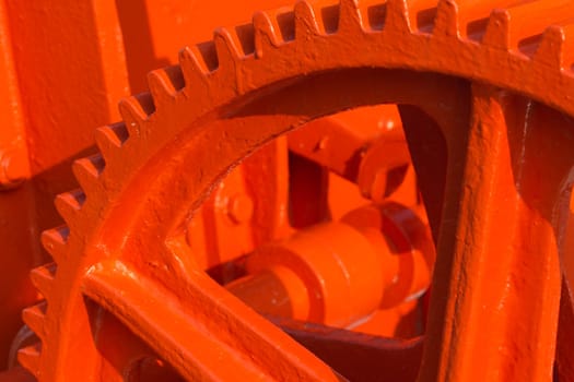 Detailed view of the red-coated gears