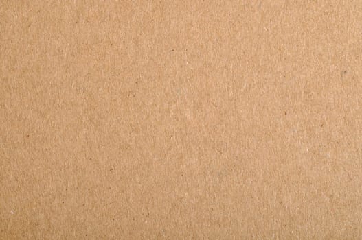 Texture of brown paper. Ecological paper with waste paper.