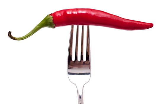 White cut-out fork with a red pepperoni