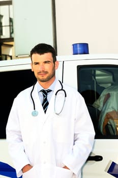 doctor is writing a report behind an ambulance