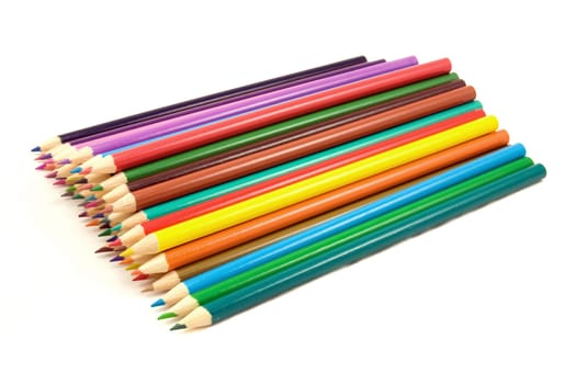 pile of multicolored pencils on white background
