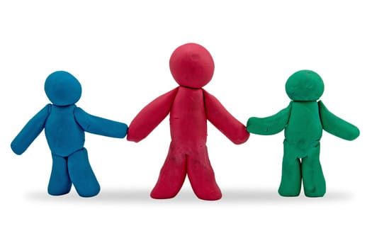 three plasticine persons over a white background