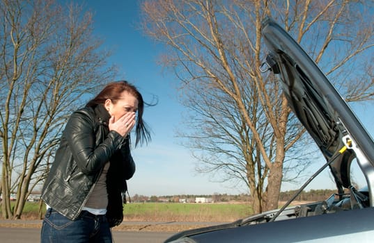 Woman has a car breakdown